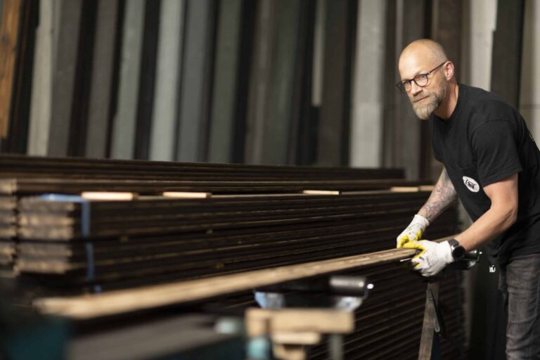 Nakamoto Forestry Europe team member producing Yakisugi pre-finished Japanese cypress boards